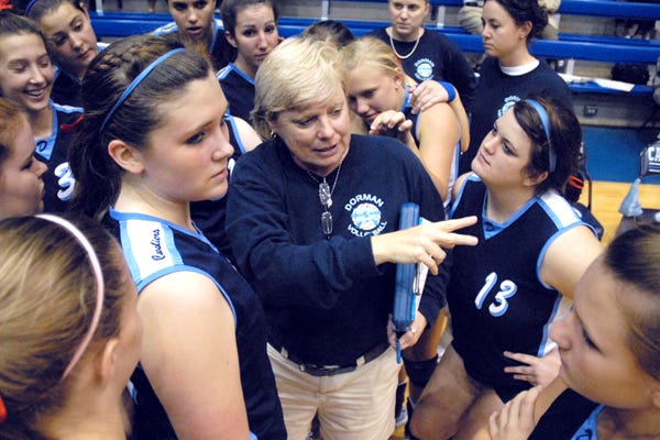 Coach Paula Kirkland, center, and the Dorman Cavaliers will host the Dorman Tournament of Champions volleyball event today and Saturday.