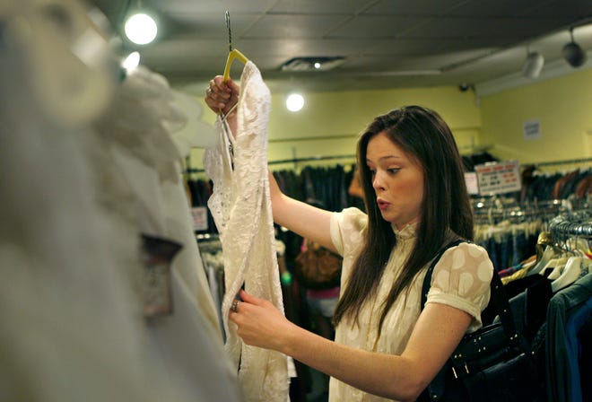 Model Coco Rocha finds an appealing garment at Cheap Jack's in New York.