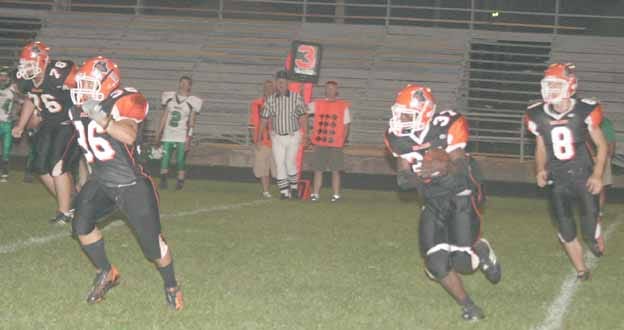 How many times has an NCIC varsity football team had three freshmen in the backfield at the same time? Probably few and far between, but last Friday Kewanee turned that trick with quarterback Jake Scott (8) handing the ball to Dontae Pryor (37) with Alphonso Inocencio (36) leading the way.