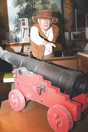 George Schweitzer, a volunteer with the East Tennessee Historical Society, explains the significance of a cast-iron cannon from the mid-1700s that is on display at the East Tennessee History Center on South Gay Street in Knoxville.