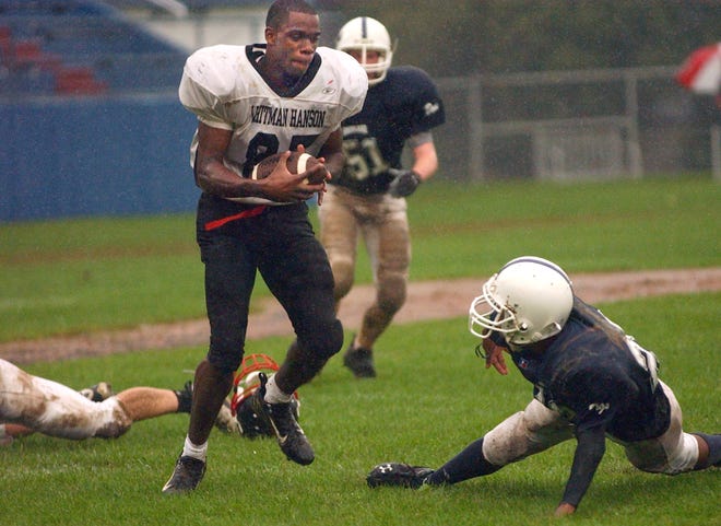 Whitman-Hanson wide receiver Noel James heads in for six points in spite having lost his helmet during the Panthers' victory on Sunday.