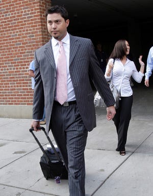 Red Sox pitcher Josh Beckett leaves Fenway Park as the team embarks on its trip west to play the Angels in the ALDS.