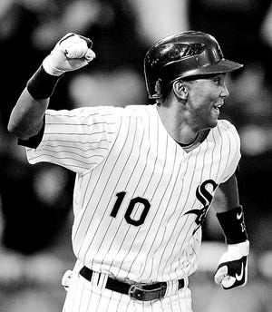 Chicago White Sox's Alexei Ramirez celebrates his grand slam during the sixth inning of a baseball game against the Detroit Tigers in Chicago, Monday, Sept. 29, 2008. (AP Photo/Charles Rex Arbogast)