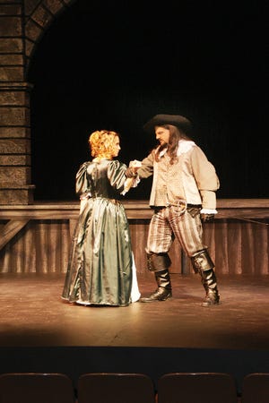 Emily Parr as Milady acts out a scene with Andrew Dunn as Athos at a dress rehearsal Wednesday night for “The Three Musketeers.”
