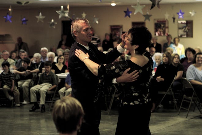 Monmouth-Roseville Superintendent Marty Payne dances the fox trot with Deb Manual at last year's Dancing for Dreams event hosted by the Warren County YMCA. The event will be Saturday at 6:30 p.m. at the Rivoli Theatre.