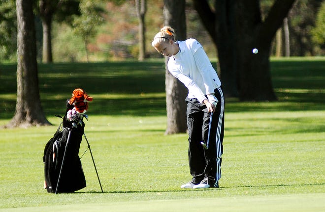 Stefanie Weiss / The Journal-Standard  
Freeport's Amelia Readeker hits the ball at hole six during the NIC-10 conference held at Park Hills Golf Course Friday.