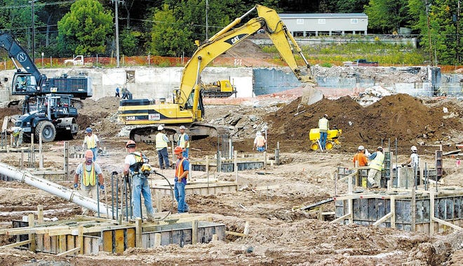 Plans are proceeding despite the nation's economic upheaval. Construction crews poured concrete for the footings last month at the new resort planned for the location where the Concord resort once stood.