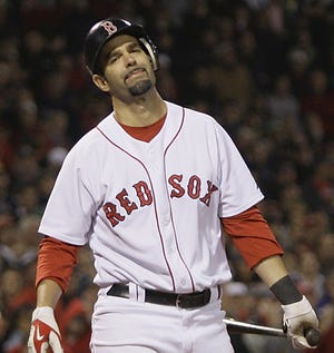 Mike Lowell reacts after striking out during Game 3 of the ALDS against the Angels.