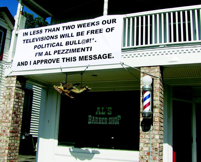 Al Pezzimenti’s disdain for the run-up to this year’s election is clear for all to see, as evidenced by this sign he put up at his barber shop on Victor’s Main Street.