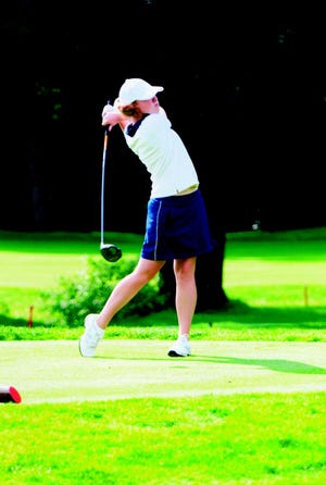 Hillsdale Academy sophomore golfer Katelyn Wollet lets a shot rip at a tournament earlier this season.