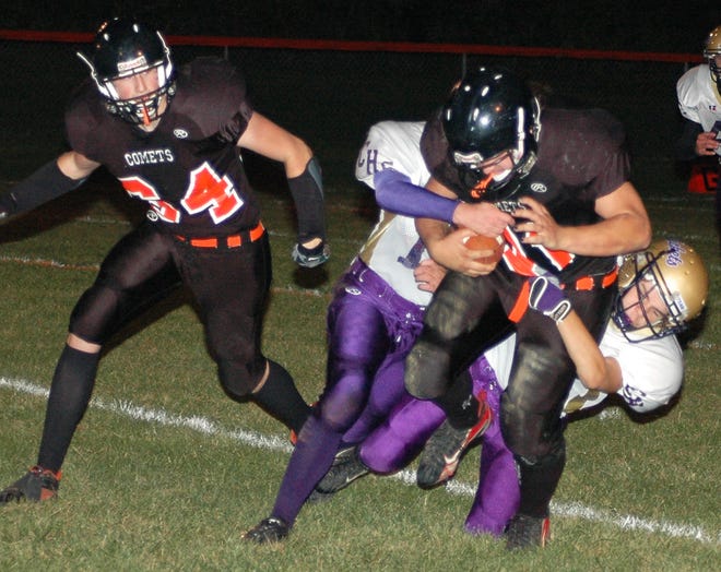 Jonesville running back Kory Kidder fights for yardage during the Comets 31-28 homecoming win over Concord Friday.
