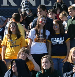 Students from Hillsdale High School show their maize and blue spirit Friday afternoon at their homecoming pep assembly Oct. 10, 2008.