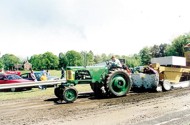 Craig and his Oliver in one of the many tractor pulls they compete in.