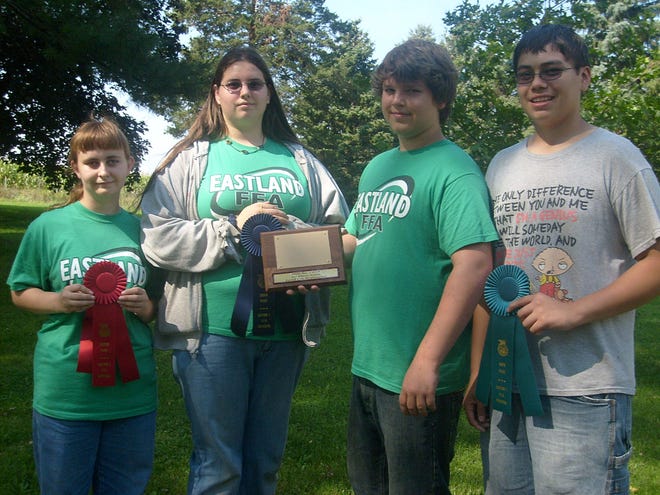 Eastland High School FFA members display awards earned in the soil judging competition. From left to right: Sarah Runyan, Toni Cline, Jordan Price, Justin Santa Cruz. Cline holds the first place ribbon awarded to the entire team.