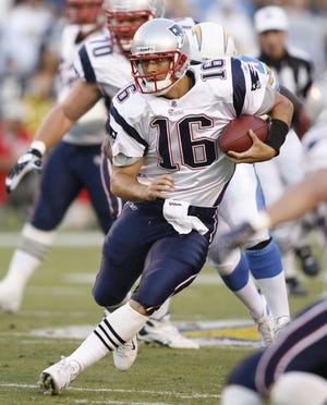 Patriots quarterback Matt Cassel runs for a first down during the first quarter of Sunday night's loss to the Chargers.