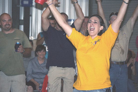Kristen Braud celebrates after hearing that she was named 2008 Cracklin Champion at the Boucherie Festival in Sorrento Sunday night. Braud is the first woman to ever win the contest