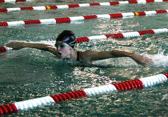 St. Amant’s Lara Hutchinson competes in the 100-yard butterfly earlier in the season. Hutchinson finished third in the 100 yard breaststroke Saturday.