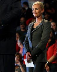 Cindy McCain, listening to her husband, John McCain, on Friday at a rally in Miami.