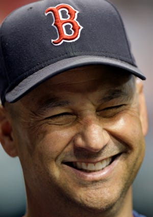 Boston Red Sox manager Terry Francona smiles before Game 6 of the American League baseball championship series against Tampa Bay Rays in St. Petersburg, Fla., Saturday, Oct. 18, 2008. (AP Photo/Mark Humphrey)