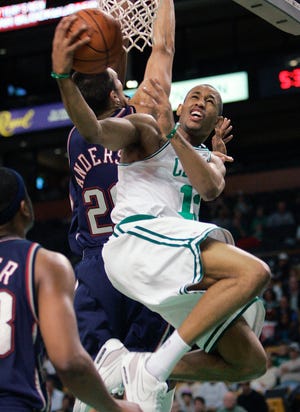 Gabe Pruitt shoots a reverse layup against the Nets' Ryan Anderson during the fourth quarter the Celtics' 83-66 victory in an exhibition game Sunday afternoon at TD Banknorth Garden.
