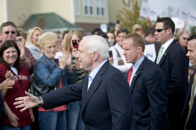 Sen. John McCain greets supporters outside Buckingham Smokehouse Bar-B-Q.