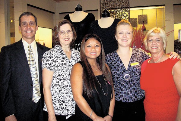 Barbara Manley, second from left, is pictured with Dillard's store manager Chris Brodeur, left, ladies manager Nikki Rosales, middle, cosmetics manager Brandy Kern, second from right, and specialist, Carol Van Cola.