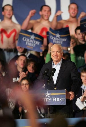 Republican presidential candidate Sen. John McCain acknowledges a cheering crowd during a campaign stop in the hockey arena at Saint Anselm College in Goffstown, N.H., Wednesday, Oct. 22, 2008.
