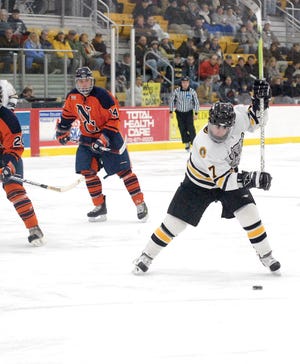 Adrian College sophomore Eric Miller prepares to fire a shot during a MCHA?contest last season. Miller led the nation with 40 goals and helped the Bulldogs average a Division III-best 7.59 goals per game last year.