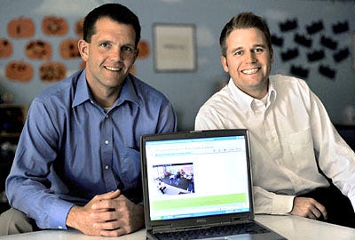 Cole McCollum, left, and Shawn Priesmeyer started bringyourchildtowork.com to help parents keep up with their children while they're at work.