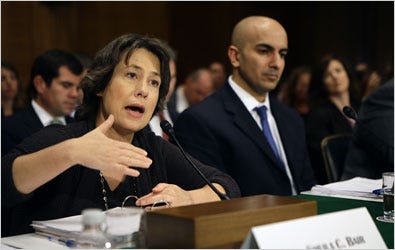 Sheila Bair of the F.D.I.C. with Neel Kashkari of Treasury at Thursday’s hearing of the Senate Banking Committee.