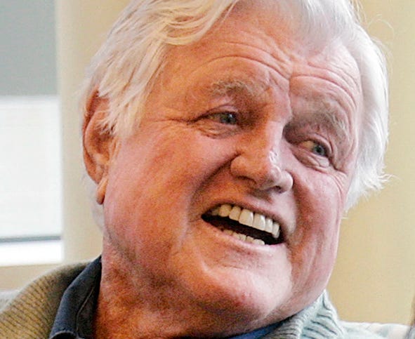 ** FILE ** In this May 20, 2008 file photo, Sen. Edward M. Kennedy, D-Mass., smiles as he sits in a family room at the Massachusetts General Hospital in Boston.