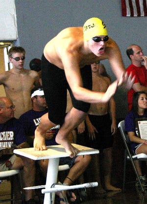St. Amant’s DJ Ridgdell starts in the boys’ 200-yard freestyle relay Sunday afternoon. Ridgdell qualified for the Division I State Swimming meet in the 100-yard breaststroke.