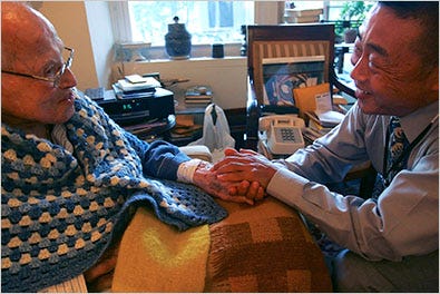Hajime Issan Koyama, 53, a Buddist monk, counsels Bertram Schaffner, 95, a psychiatrist and AIDS treatment pioneer, as he suffers from prostate cancer.
