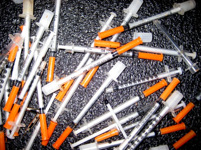 More than 30 used syringes werefound Thursday in the road at two locations, near Gardner and North Main streets and at King Phillip and South Main streets in 
Raynham.  

 

 

Officer Jeffery Crandall from the Raynham Police Department recovered over 30 used syringes in two locations in Raynham on Thursday 10/30. The locations were on public roads near the intersection of Gardner and North Main Street and King Phillip and South Main Street. Parents should warn their children that used syringes can be an extremely dangerous item and if found they should be reported to the Police Department immediately for safe disposal.

 

Syringes were legalized without a prescription in Massachusetts in 2006 and as a result more are finding their way to being dumped in public areas. These syringes often carry diseases that can be transferred from the needle to a person who is accidently "stuck" by one of the needles. The above pictures from the ones found today are typical of what is being abandoned by illegal drug users and children should be made aware of the dangers.