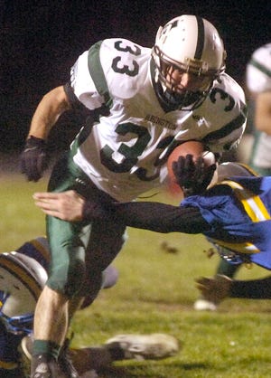 Abington running back Kristian LaPointe carries it the ball in for a touchdown during the Green Wave's 32-2 win on Thursday night.