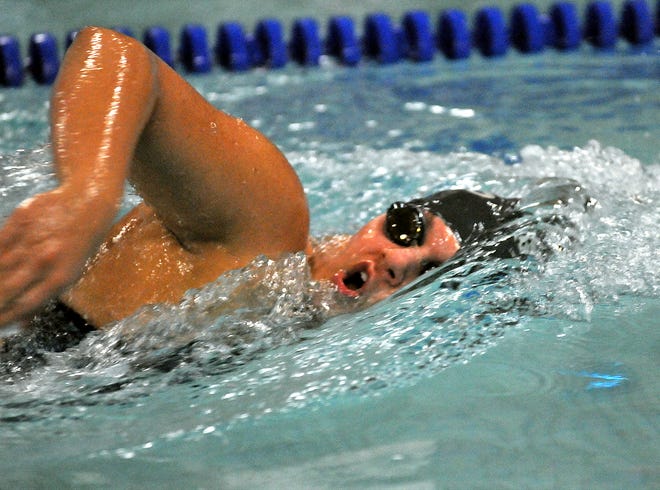 Framingham's Amanda Miles competes in the 200-yard freestyle during yesterday's meet with Natick.