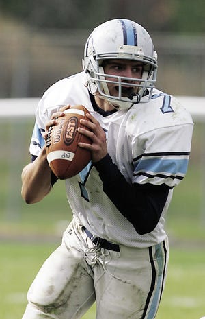 Bristol-Plymouth quarterback Evan Cabral looks for open receivers during Saturday's game.