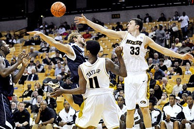Missouri's Matt Lawrence, right, blocks a shot by Lincoln's Kyle Wilde in the first half of the Tigers' 97-54 victory in an exhibition game at Mizzou Arena. Â?Â  See the Slide Show