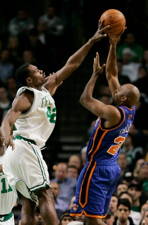Celtics' Tony Allen reaches out to block a shot by Mardy Collins of the Knicks on Tuesday night in Boston.