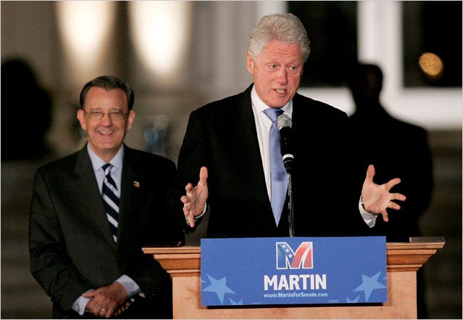 Bill Clinton at a rally for Jim Martin, left, at Clark Atlanta University in Georgia on Wednesday. In New York, Mr. Clinton said of the nomination talks, “I’ll do whatever they want.”