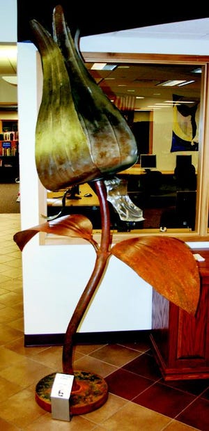 Metal sculptures from the Iron One Foundation, a welding class through the Alpena Community College, will be on display at the Cheboygan Area Public Library until Saturday, Nov. 29. Included in the exhibit is "A Very Rare Flower" by Betty Jane Godrey.