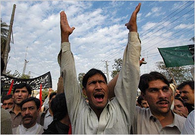 In Peshawar on Saturday, Pakistanis condemned an American missile attack that killed a British militant.
