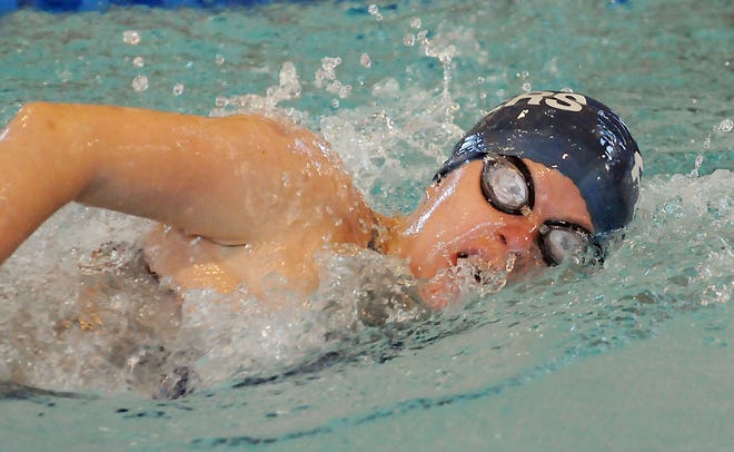 Framingham's Aubrey Courville competes in the 500-yard freestyle on Sunday at the Div. 1 state meet.