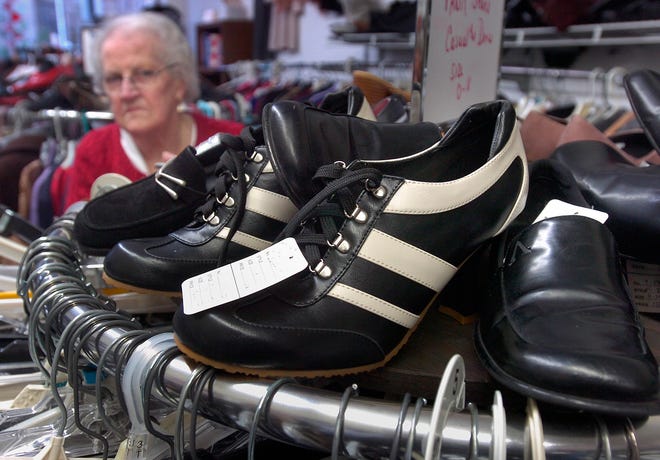 The recession is sending more people to discount stores and consignment shops like Finders Keepers -- and it's highlighting an age-old American habit of looking for a bargain. Midge Buckley looks at shoes.
