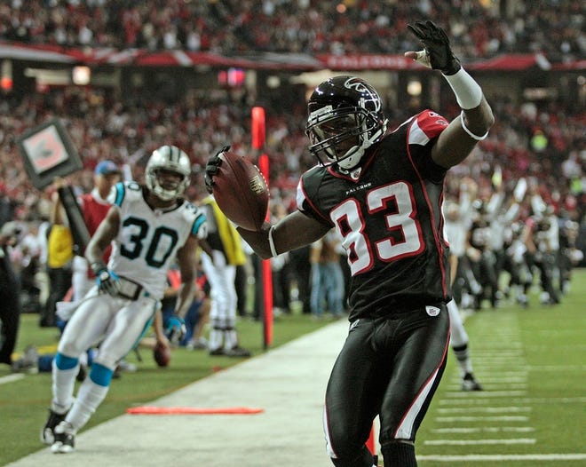 Atlanta Falcons receiver Harry Douglas (83) celebrates after scoring on a 
7-yard run in the first quarter in Atlanta on Sunday. The Falcons won 
45-28.