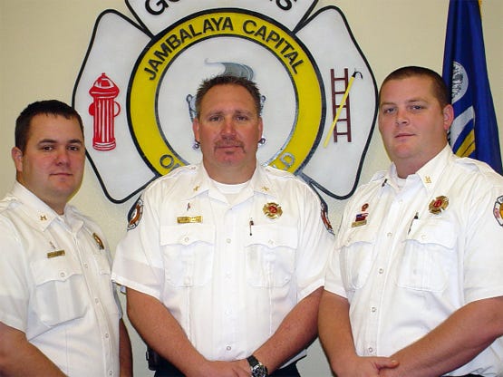 Tracey Normand, center, has been named Gonzales Fire Chief by Mayor Johnny Berthelot. Also named to District Fire Chief posts were Preston Landry, left, and Kris Johnson.