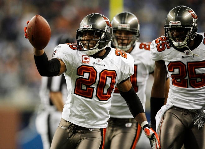 Buccaneers cornerback Ronde Barber celebrates one of his two interceptions in Detroit on Sunday. Barber was named NFC Defensive Player of the Week on 
Wednesday.