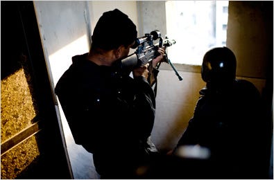 Sniper commandos on an apartment building across the street from a Chabad house on Thursday prepared for an attack.