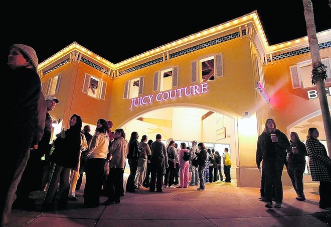 The line early Friday outside Juicy Couture, at Prime Outlets in Ellenton.
