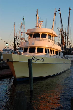 JIM SUTTON/The Times-Union
A fresh sun rises on Jacksonville's newest charter fishing boat, the Majesty. The 70-footer replaces the familiar King Neptune on Mayport's maritime skyline.